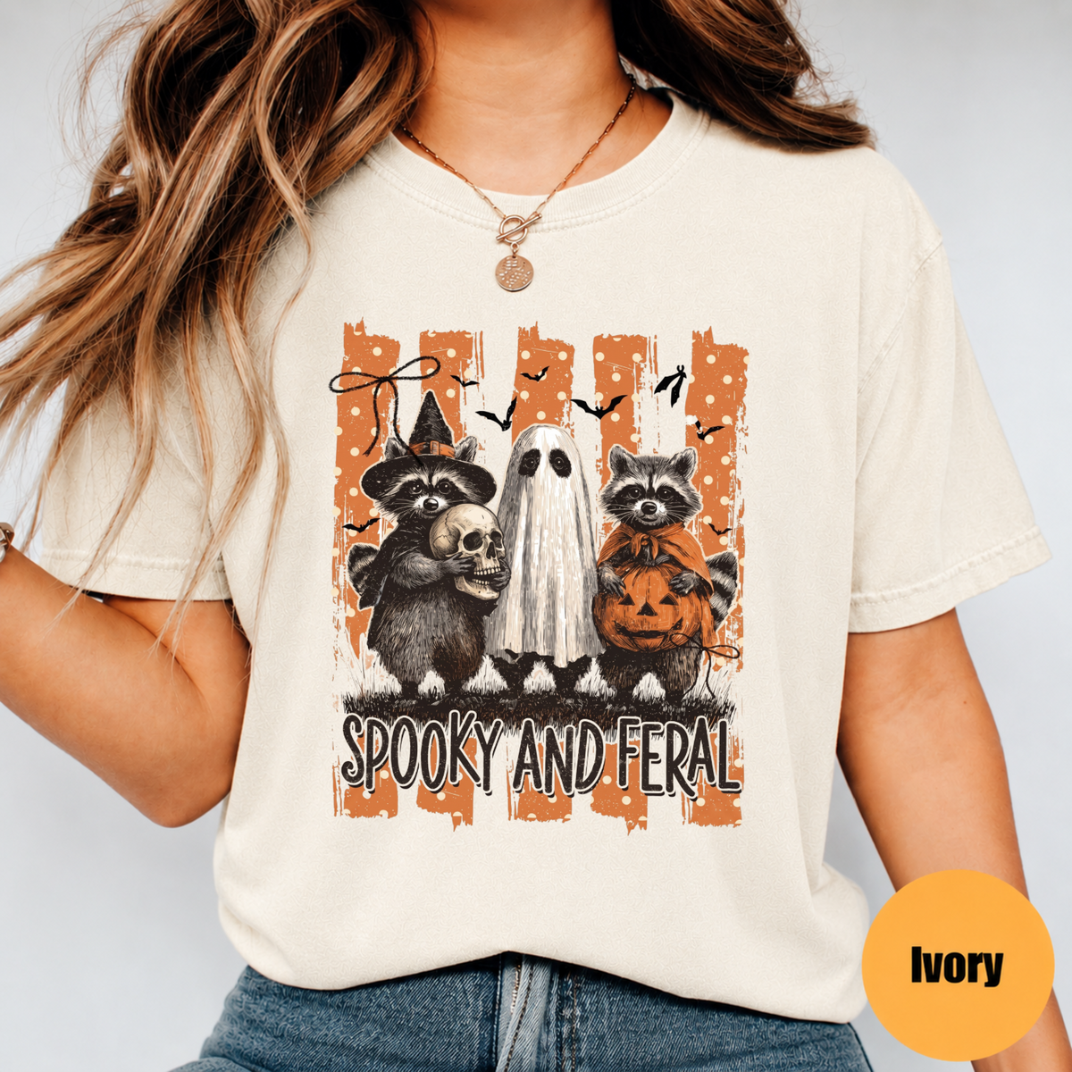 Spooky and Feral Halloween shirt with raccoons ghost skull and pumpkin graphic